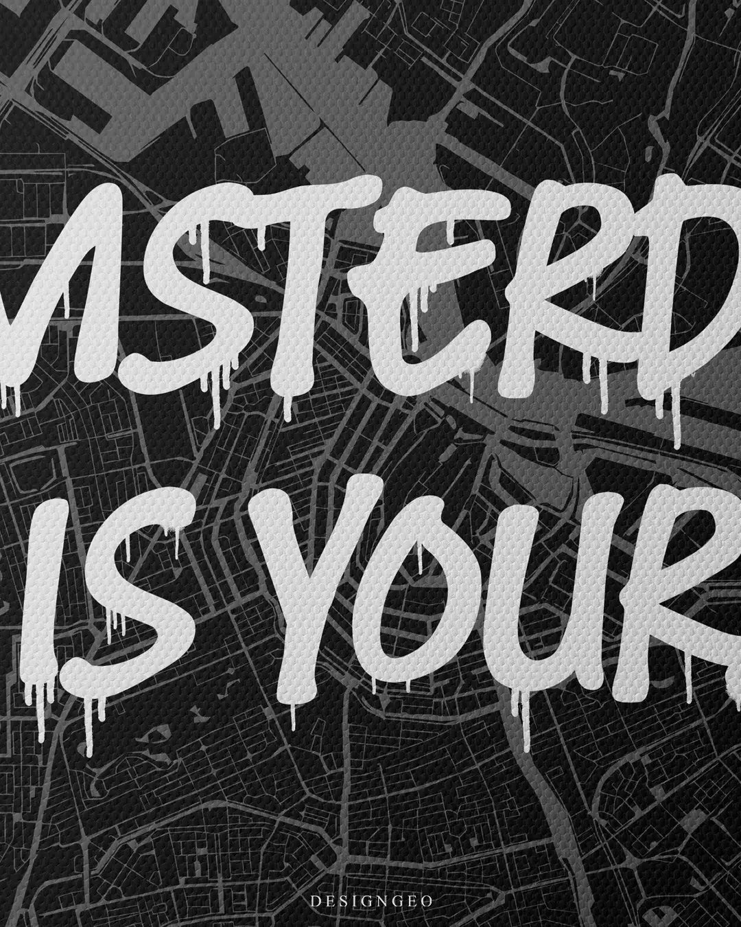 Close-up of minimalist city map art featuring Amsterdam's detailed canal ring urban grid with the motivational phrase "Amsterdam is Yours" in crisp white graffiti typography on a dark background