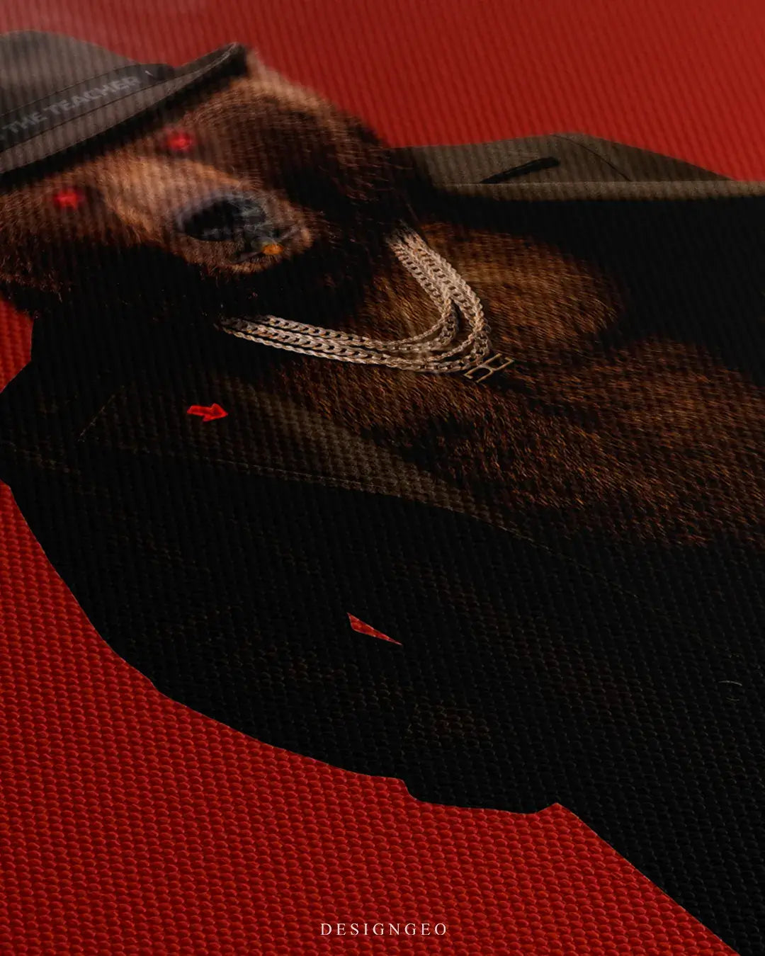 Close-up of Bear Market canvas wall art featuring a bear in a suit with glowing red eyes and gold chains on a red background