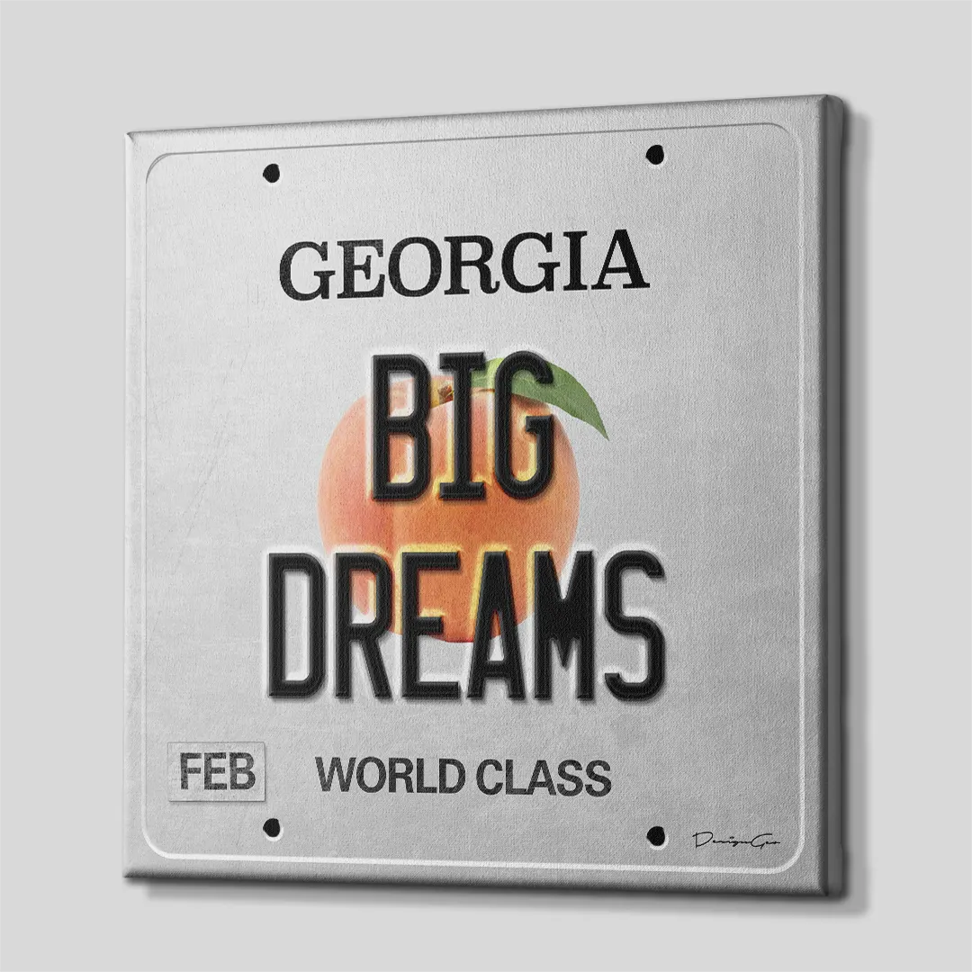 Three-quarter side angle of the Georgia license plate canvas wall art showing gallery-wrapped light gray edges mounted on a solid wooden frame