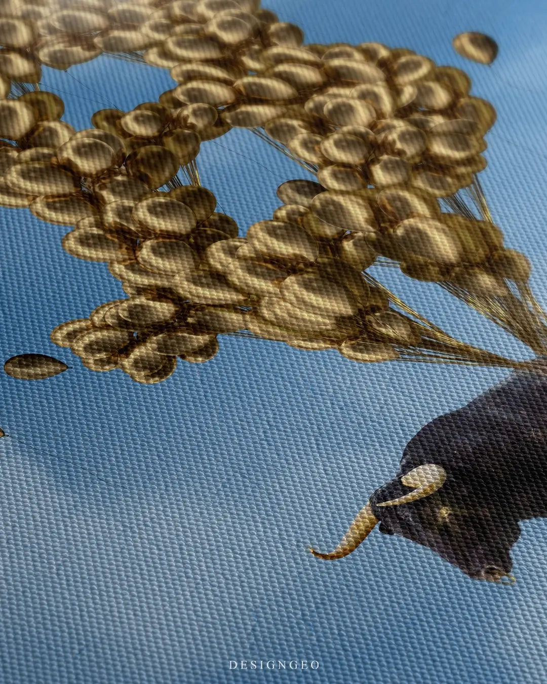 Close-up of surreal crypto wall art featuring a powerful bull tied to orange balloons forming the Bitcoin "B" symbol, flying against a bright blue sky