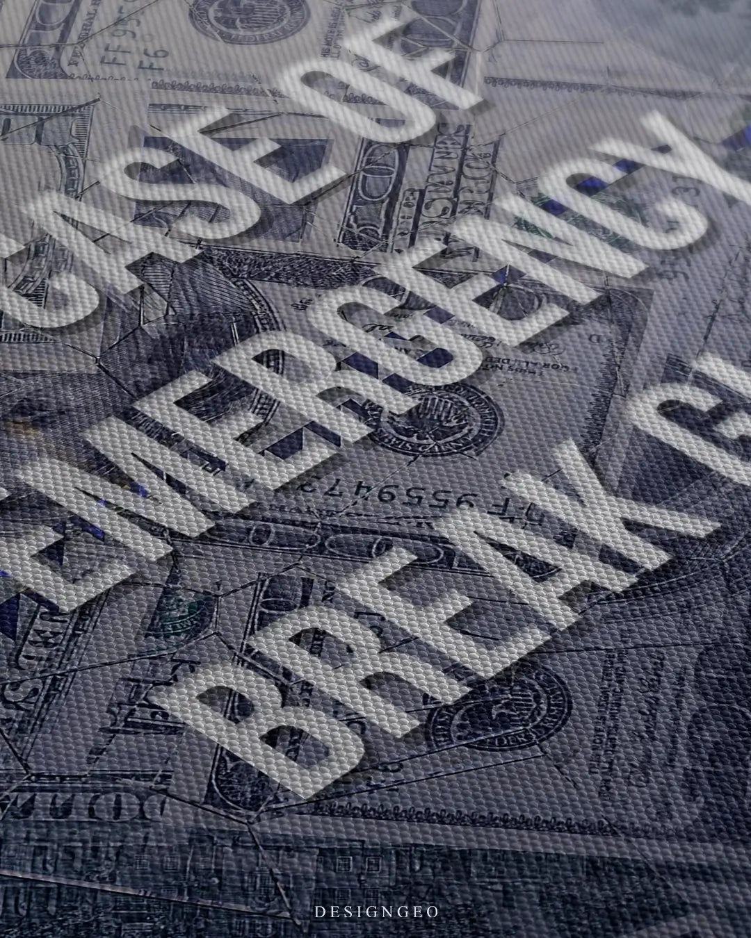 Close-up of motivational wall art featuring $100 dollar bills behind a glass effect with the bold phrase Break Glass in a modern typography style