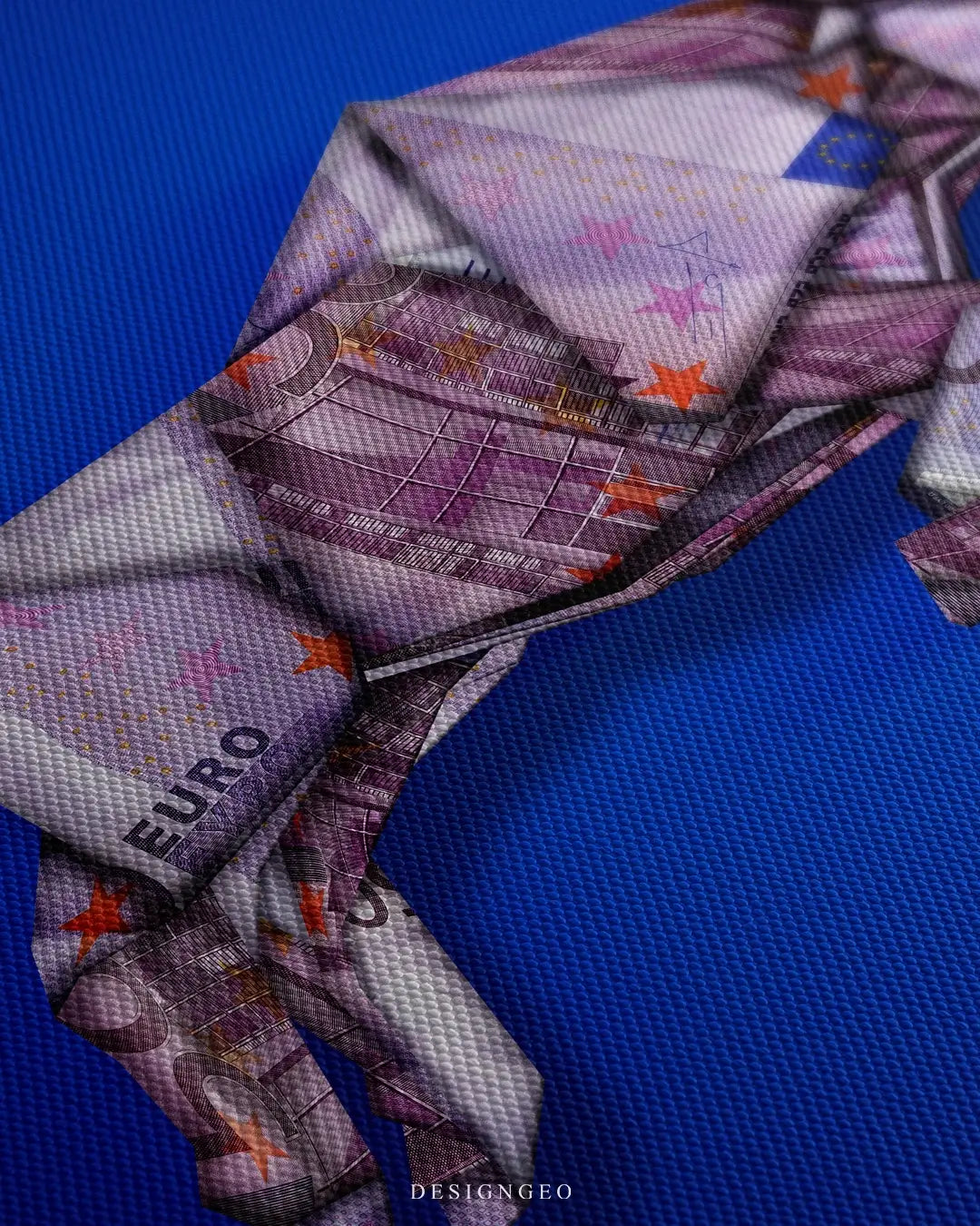 Close-up of minimalist finance wall art featuring a tactical bull figure intricately folded from purple Euro banknotes with a glowing golden crown on a solid blue background