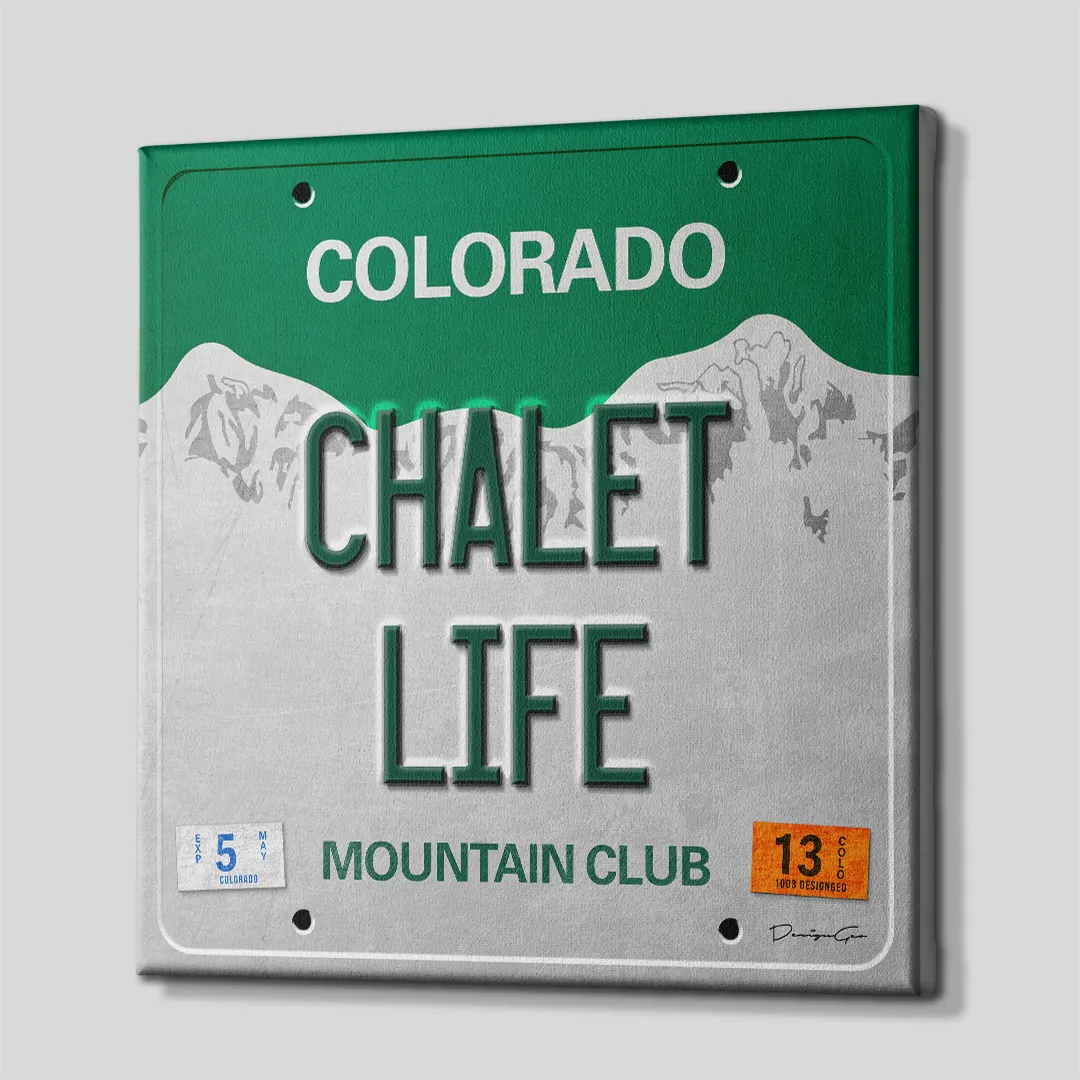 Three-quarter side angle of the Colorado license plate canvas wall art showing gallery-wrapped green edges mounted on a solid wooden frame