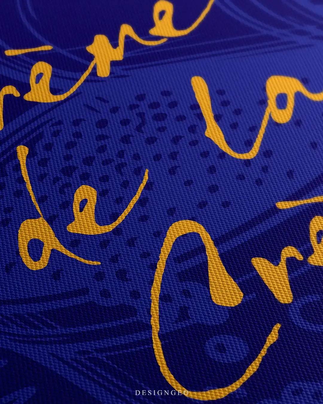 Close-up of modern luxury wall art featuring the phrase "Crème de la Crème" in elegant yellow typography over an abstract deep blue background inspired by premium caviar branding
