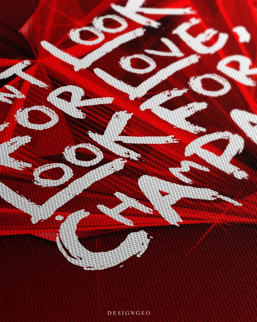 Close-up of modern wall art featuring a white motivational quote layered over a minimalist geometric heart on a vibrant deep red background