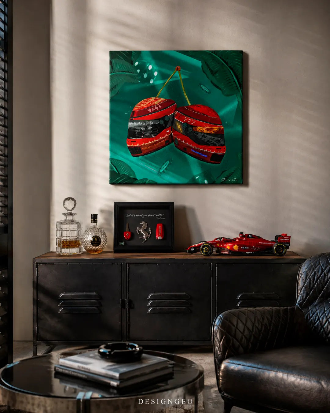 Square Double Down F1 helmet cherries canvas print mounted on a beige wall above an industrial metal Credenza with a red Ferrari F1 model car, framed key display, whiskey decanter, and black leather armchair