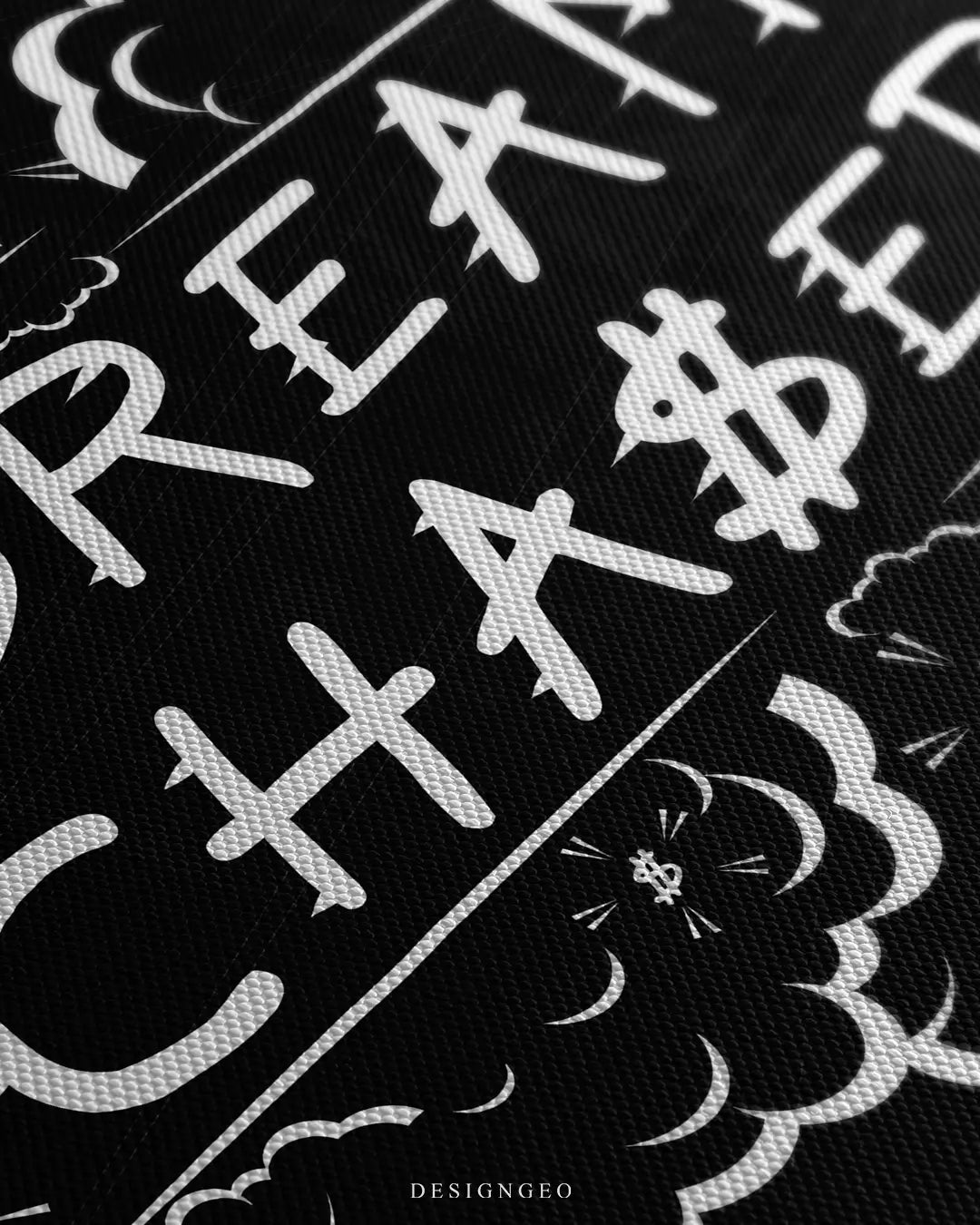 Close-up of minimalist motivational wall art featuring a powerful success quote in clean white typography on a solid black background