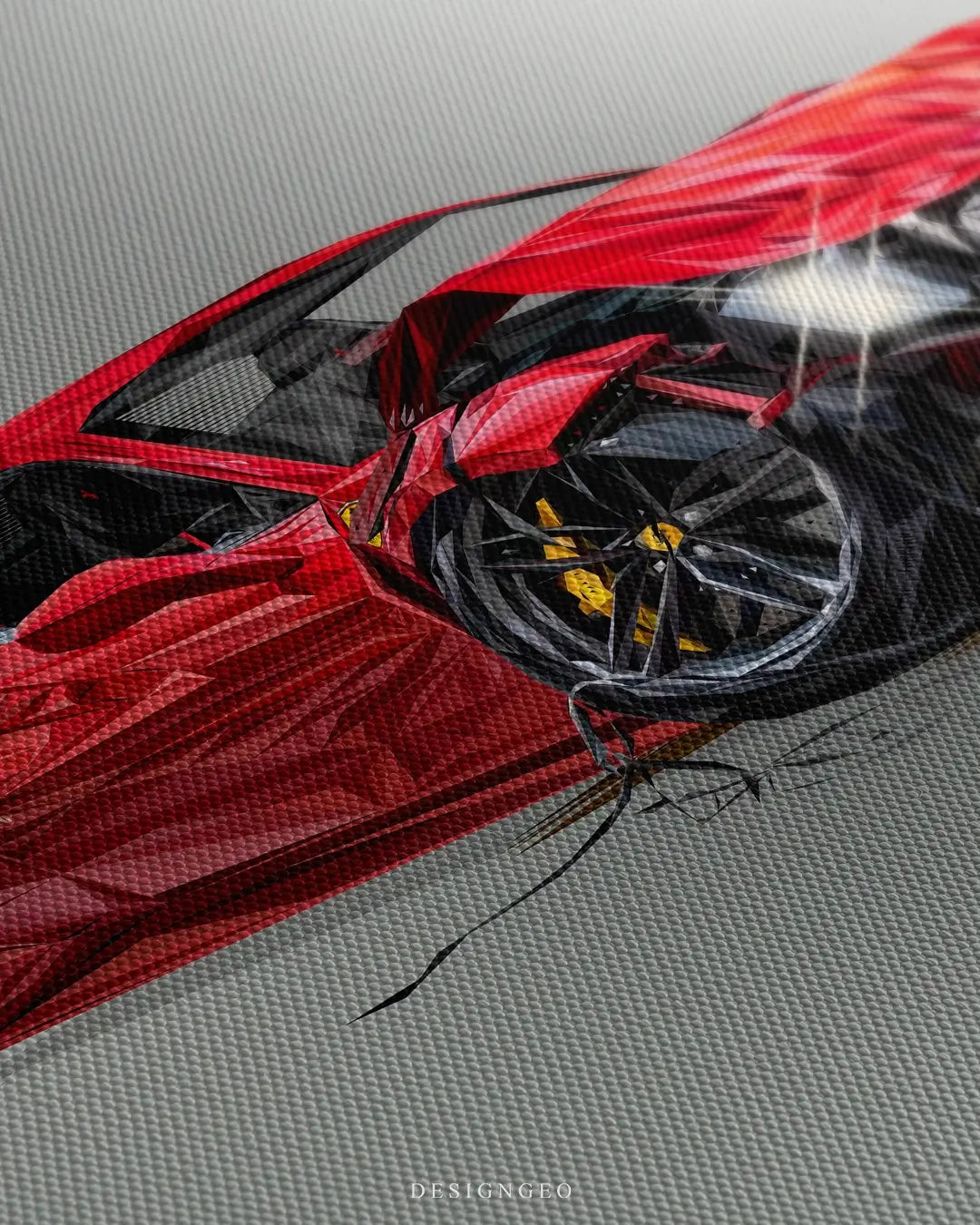 Close-up of modern luxury wall art featuring a red high-end sports car with impact damage on a minimalist dark gray background