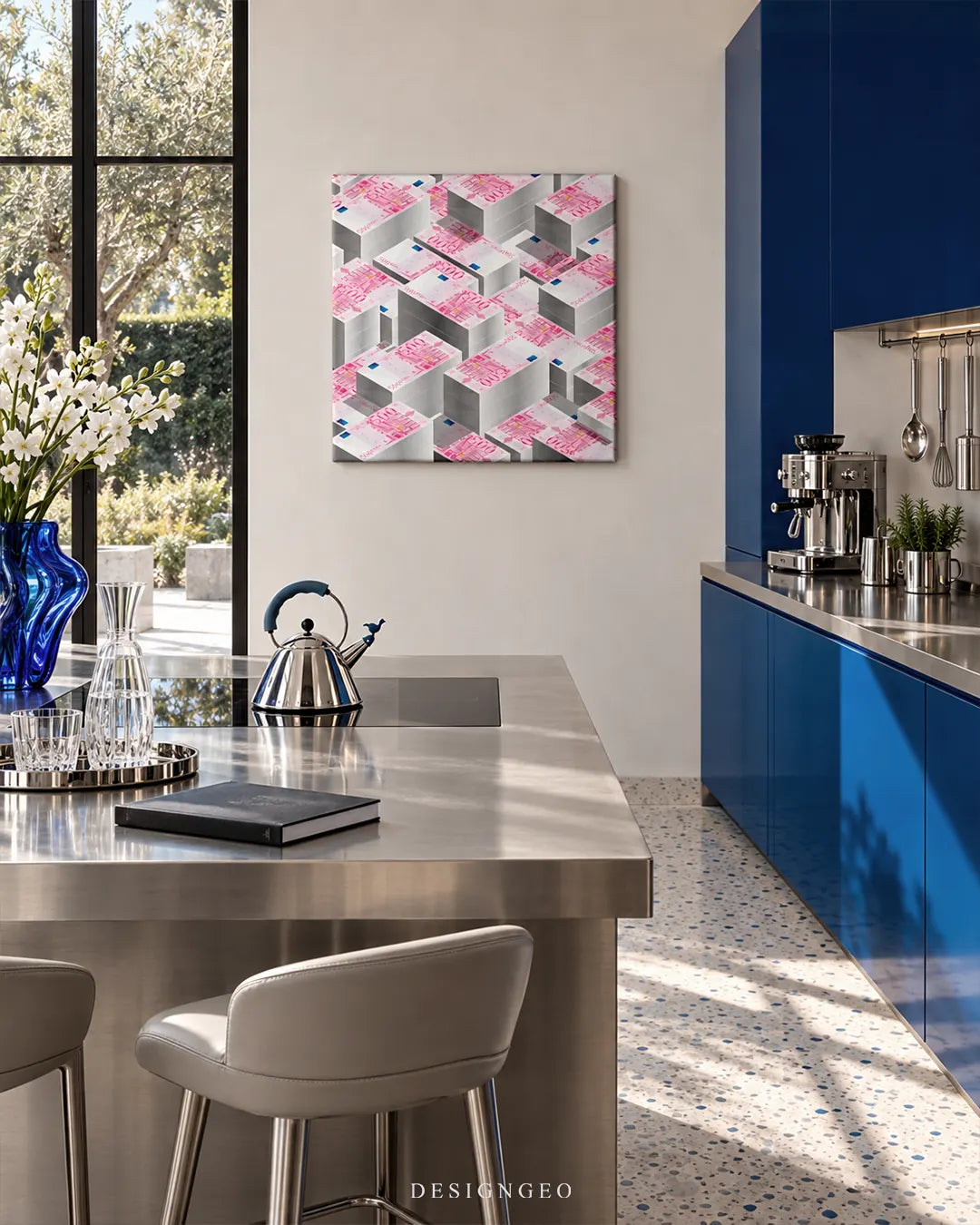 Square canvas print featuring an isometric pattern of 500 Euro banknote stacks mounted on a light beige wall in a modern kitchen with blue cabinets and a stainless steel island