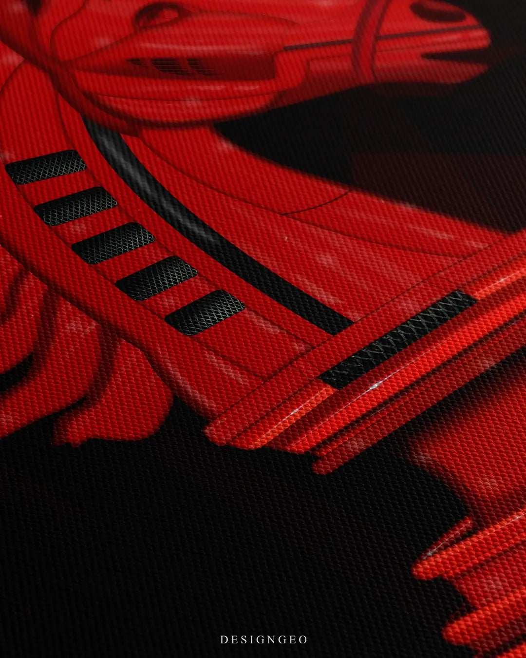 Close-up of modern luxury wall art featuring a red chess knight piece with sleek automotive textures and metallic finishes on a deep black background