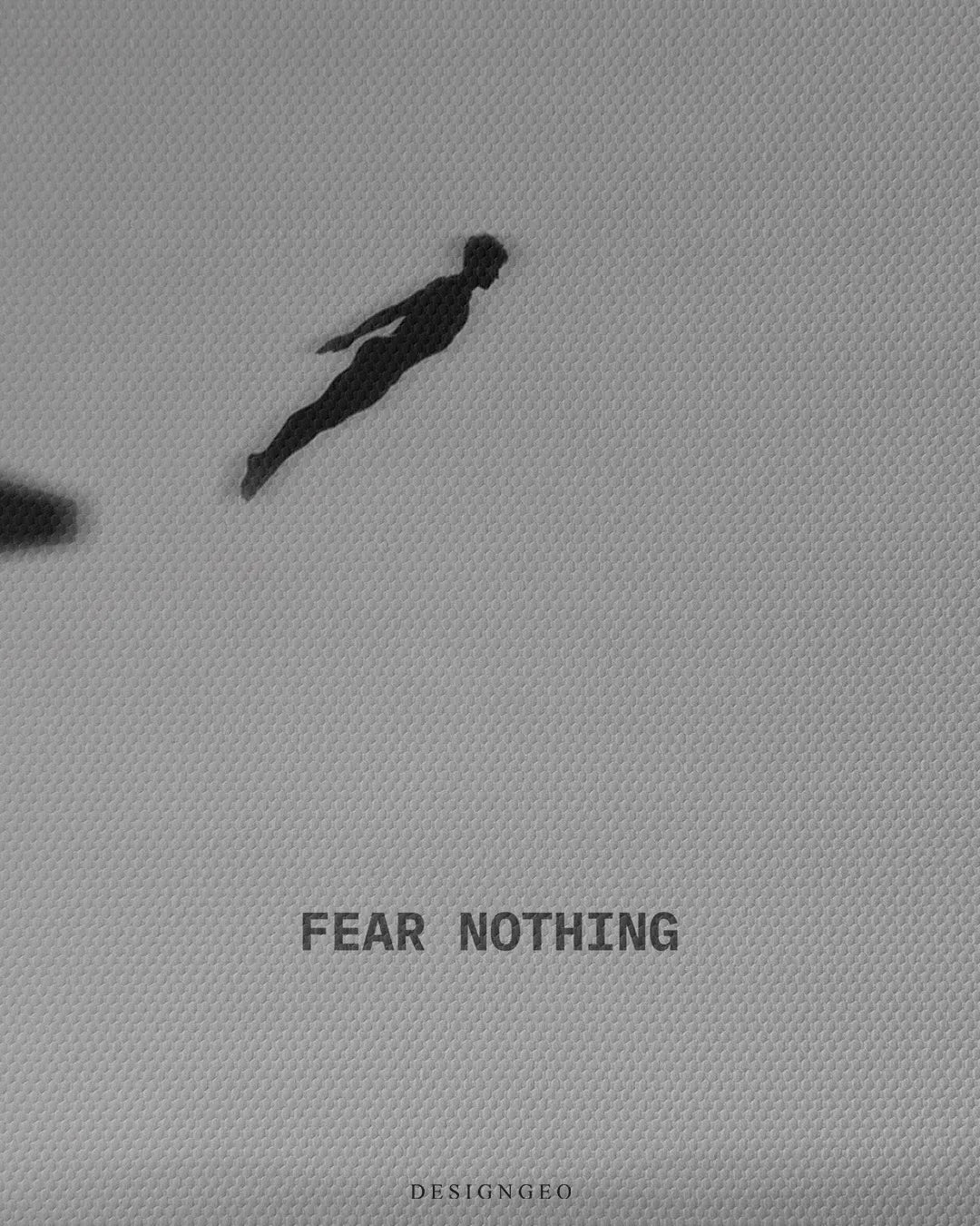 Close up texture view of Fear Nothing typography quote printed on fine woven canvas near diver silhouette square canvas wall art 0.75 inch thin wrap
