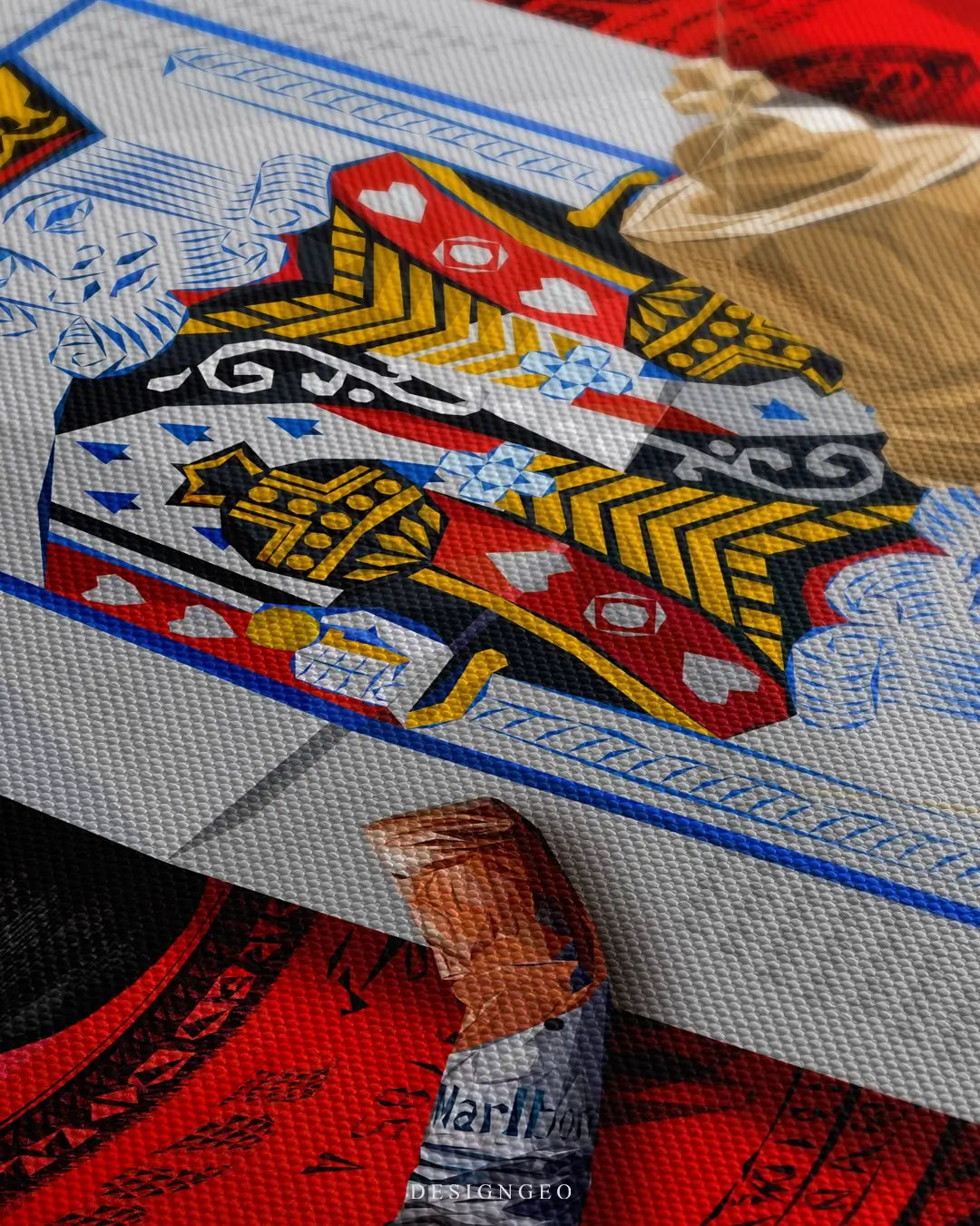 Close-up of casino-themed canvas art showing detailed textures of playing cards, dice, and golden chips on an intense red background
