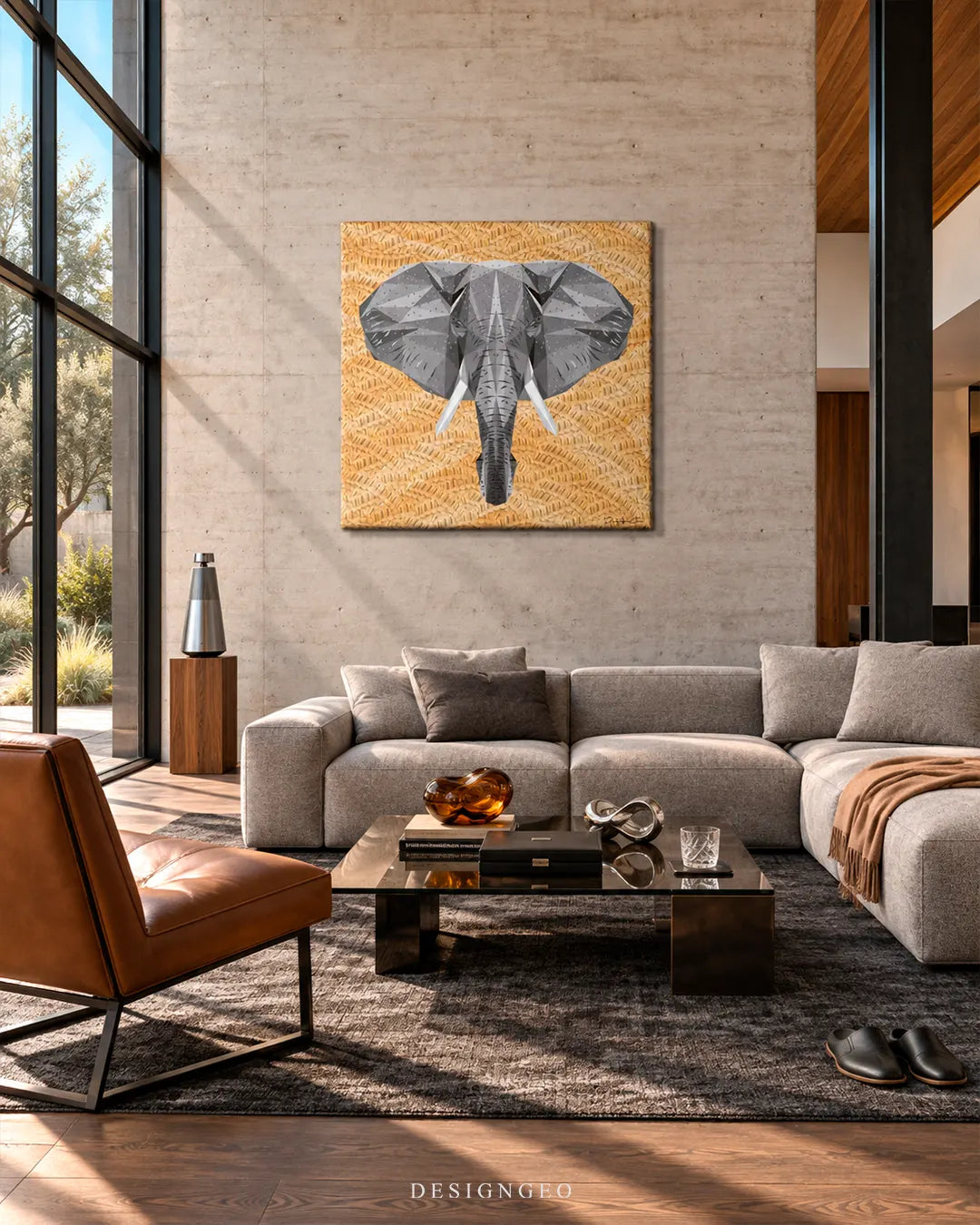 Geometric elephant head square canvas print displayed on a concrete wall above a beige sectional sofa in a modern luxury living room