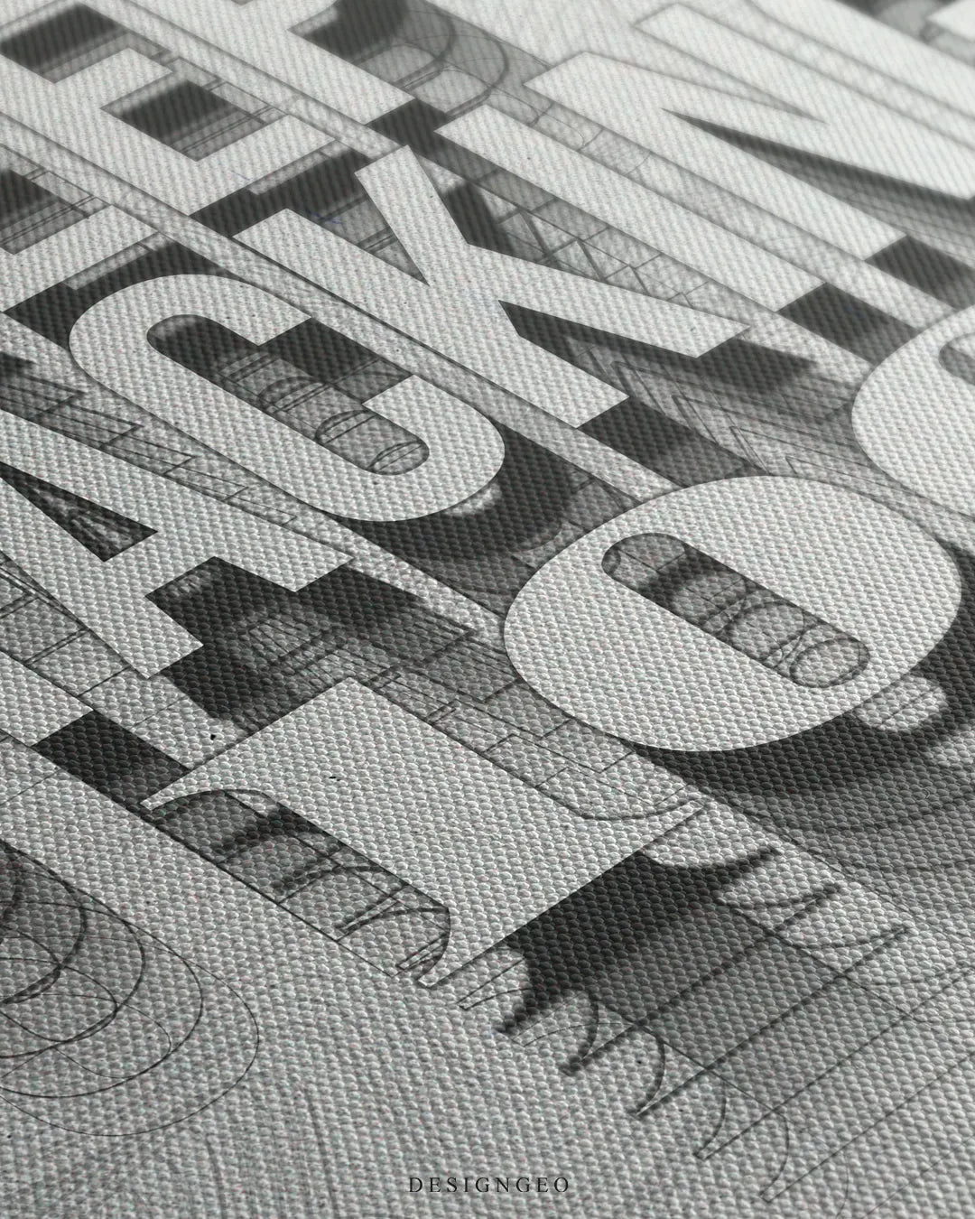 Angled close-up detail shot highlighting the extruded 3D drop shadow effect on KEEP STACKING 100 lettering and fine woven canvas fabric texture