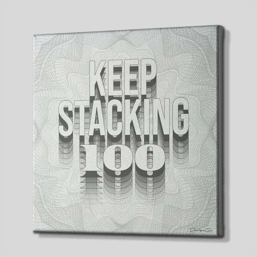Three-quarter side angle of the KEEP STACKING 100 canvas wall art showing light gray gallery-wrapped edges mounted on a solid wooden frame