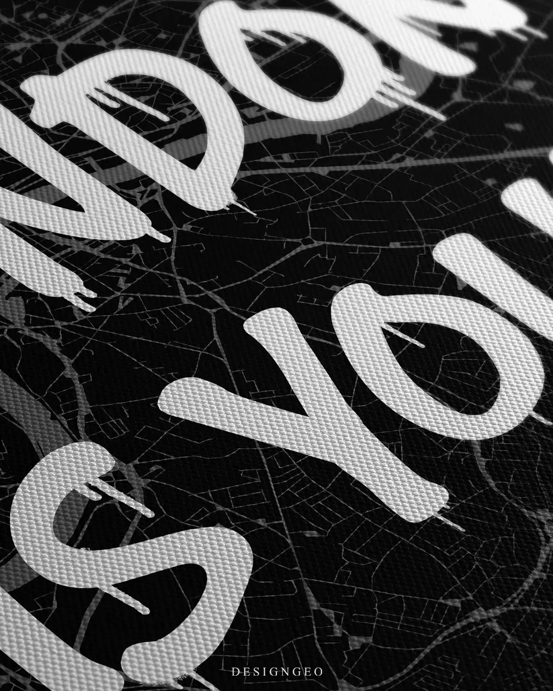 Detailed view of the "London is Yours" art, showcasing the high-contrast white spray-paint lettering layered over the intricate cartographic layout of the London metropolitan area