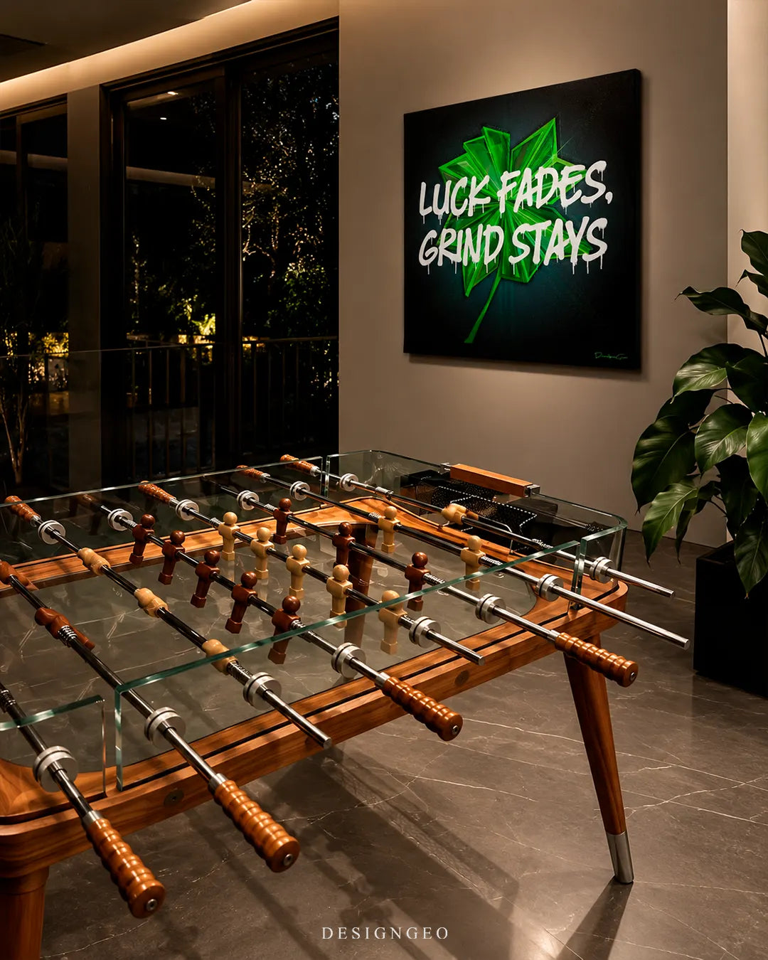 Luck Fades Grind Stays green four-leaf clover graffiti square canvas wall art mounted on wall in luxury game room above wooden foosball table 0.75 inch thin wrap
