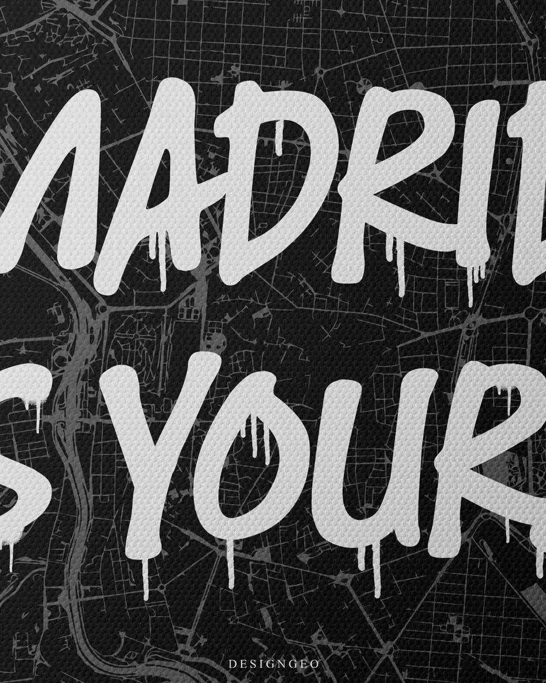 Front close-up of urban city map wall art of Madrid highlighting the premium canvas texture and bold white graffiti text with realistic paint drips on a dark cartographic background