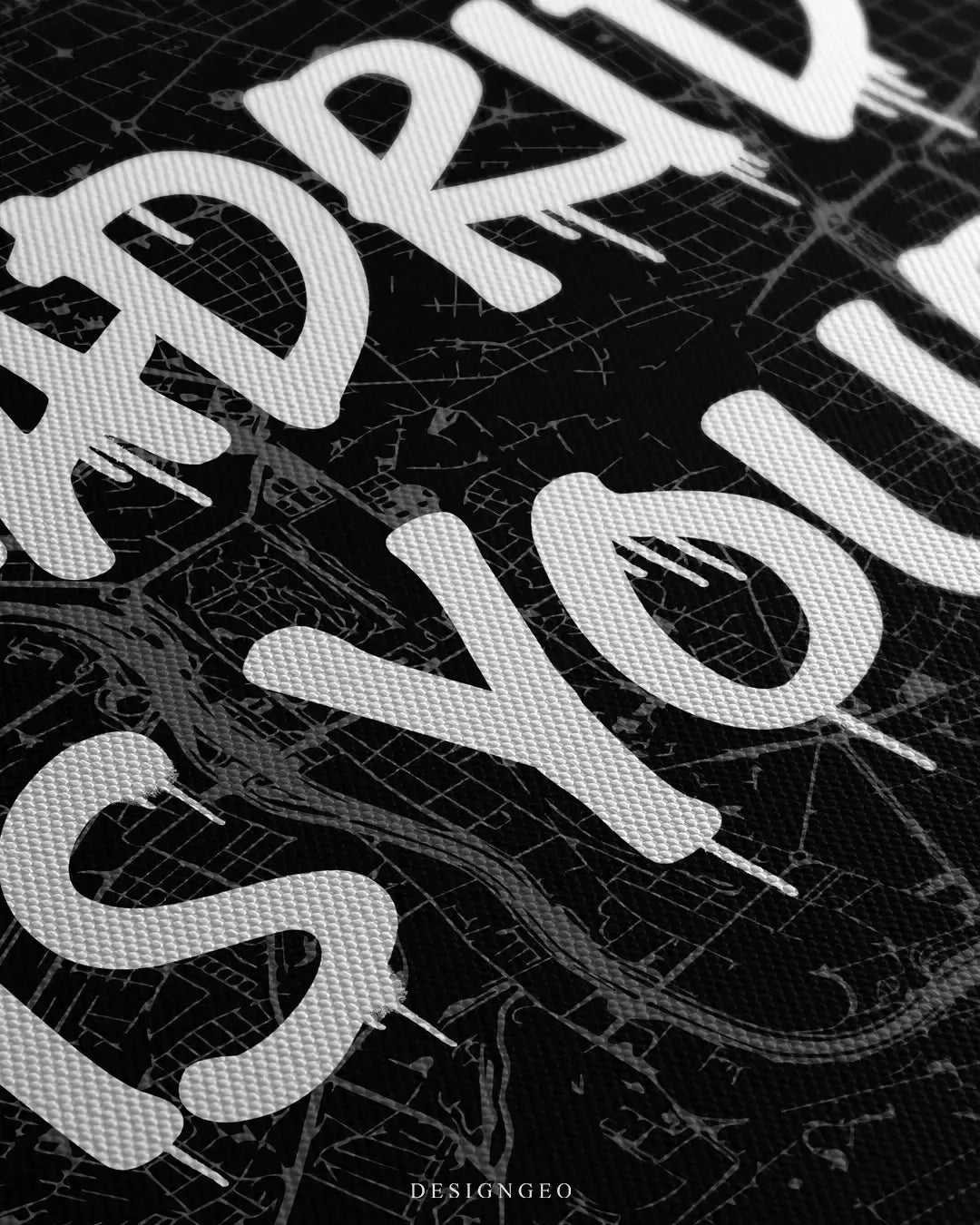 Angled detailed view of the "Madrid is Yours" square canvas print, showcasing the high-resolution woven canvas material and intricate street map grid lines under bold white spray-paint lettering