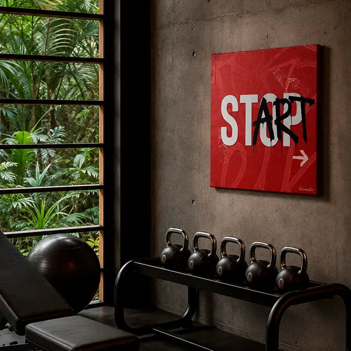Motivational canvas wall art collection with red urban street art reading STOP spray-painted over to say START on a home gym wall