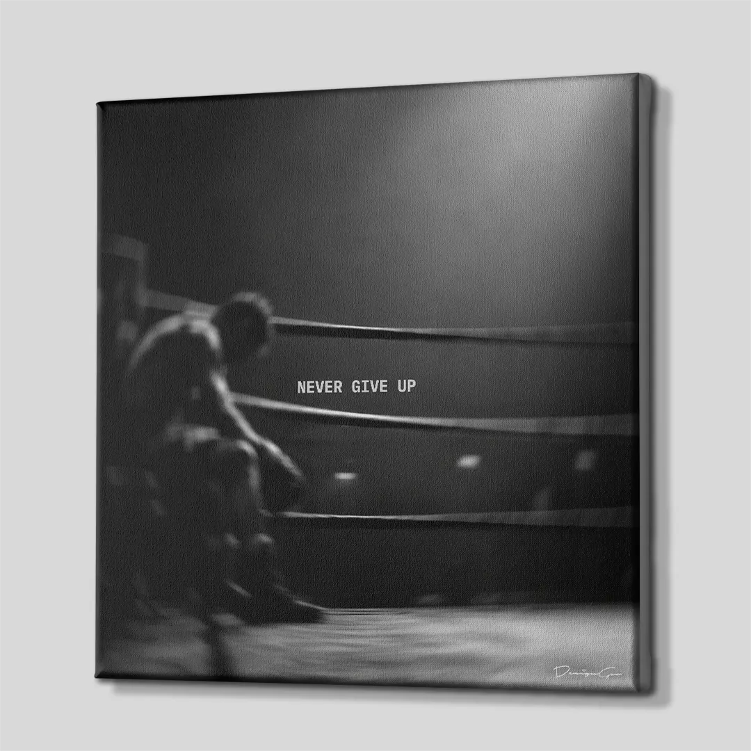 Side perspective view of black and white inspirational square canvas art showing boxer sitting in ring corner design with black gallery wrapped edge 0.75 inch thin wrap
