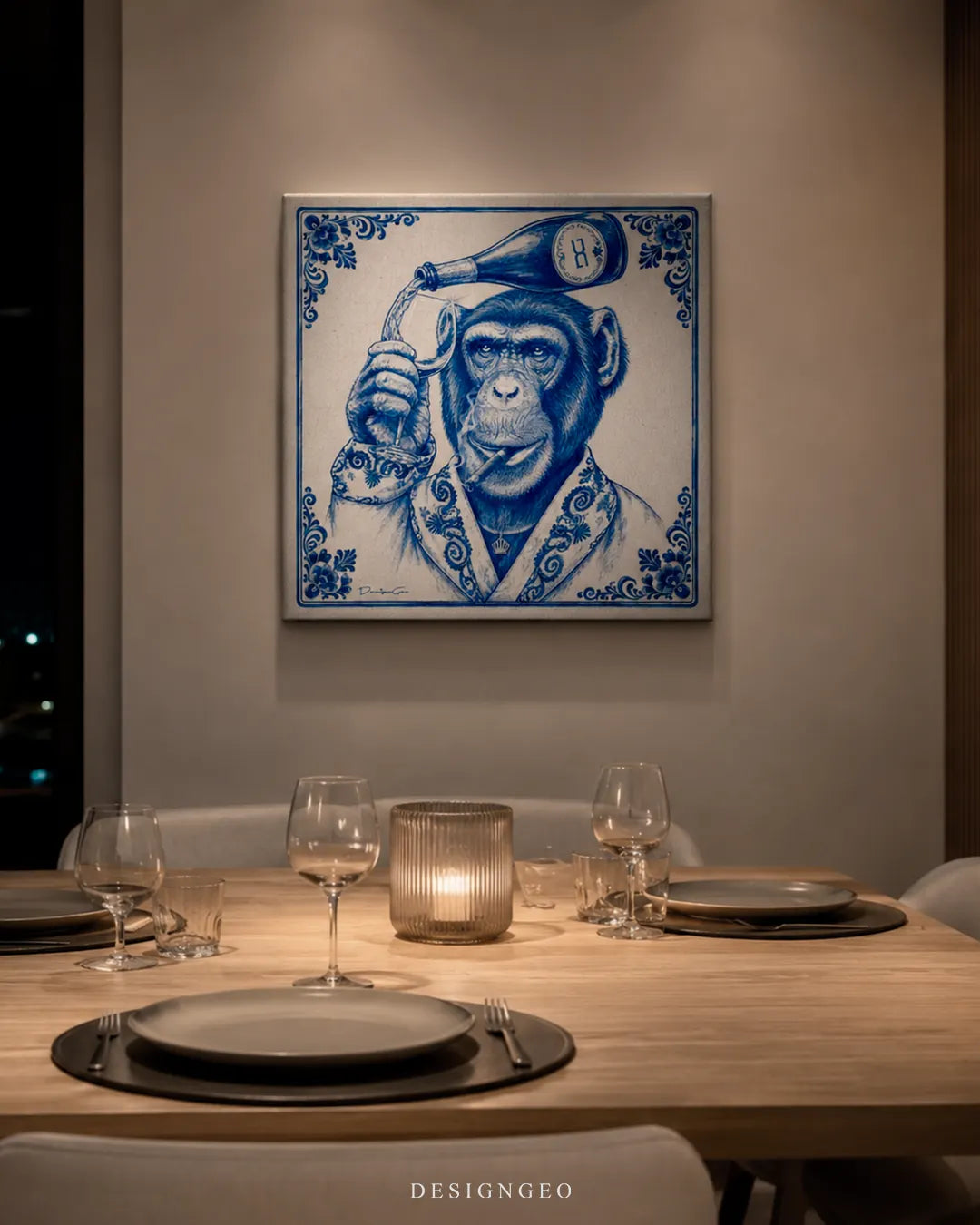 Sophisticated dining room setup with the square blue and white chimpanzee canvas art mounted above a set wooden dinner table with wine glasses and candlelight