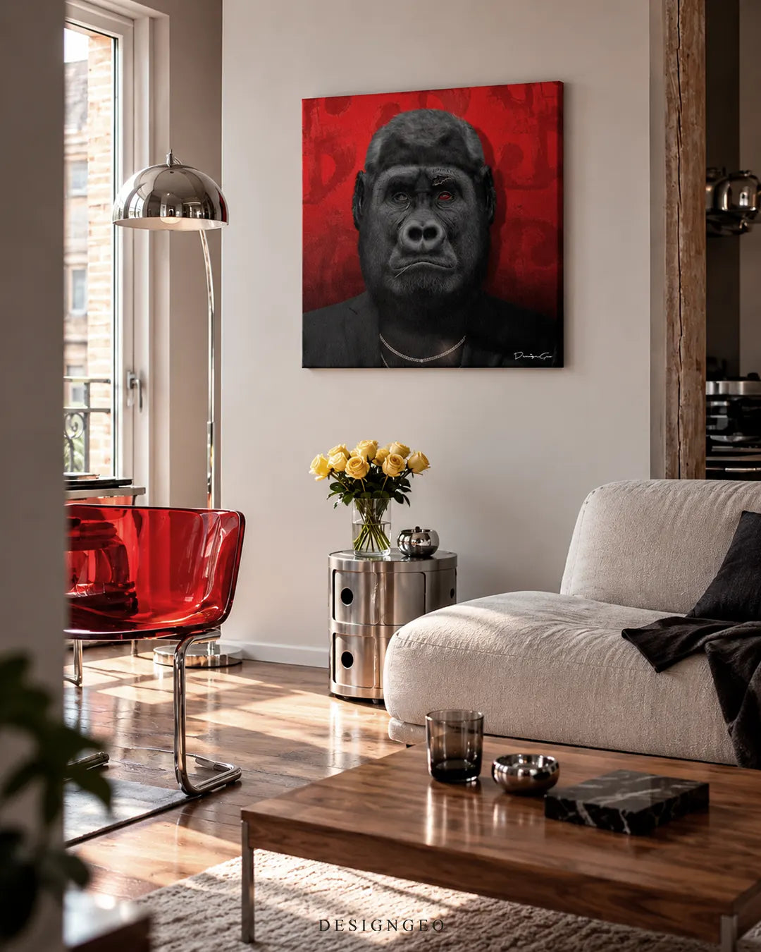 Black gorilla portrait on red backdrop square canvas wall art displayed on a white wall in a modern living room above a beige couch 0.75 inch thin wrap