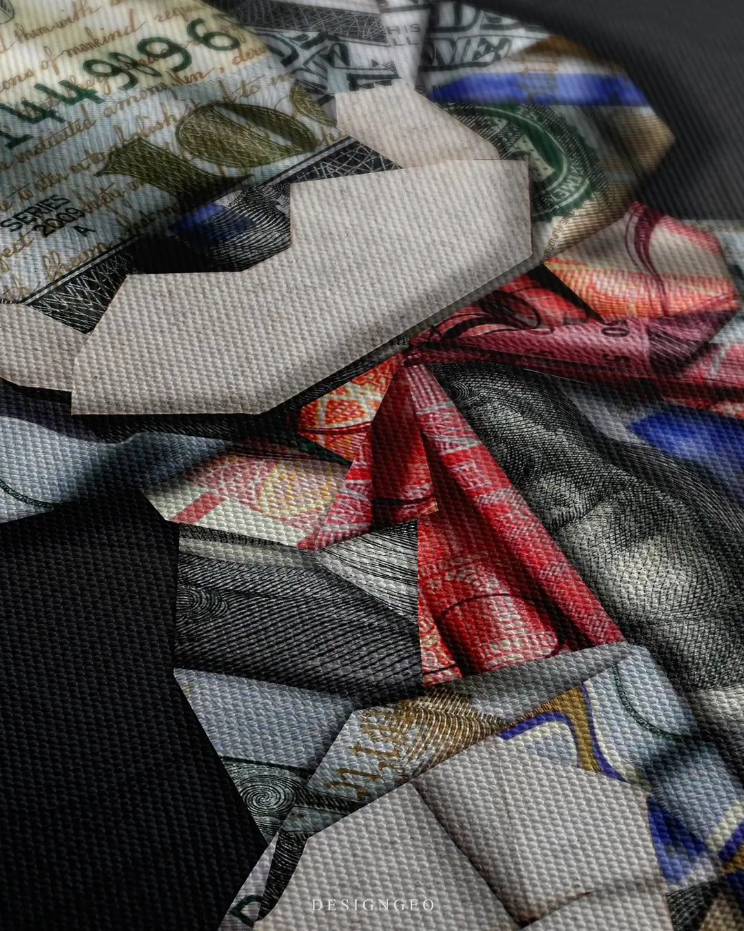 Close-up of dollar origami art showing a teddy bear intricately folded from realistic US hundred-dollar bills with detailed paper textures on canvas