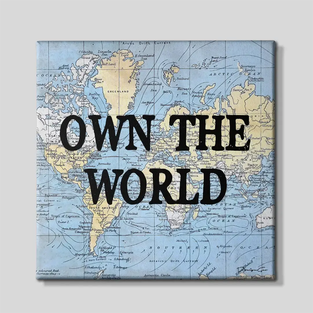Square canvas wall art with a blue and beige vintage world map design and the motivational quote OWN THE WORLD centered in black capital letters