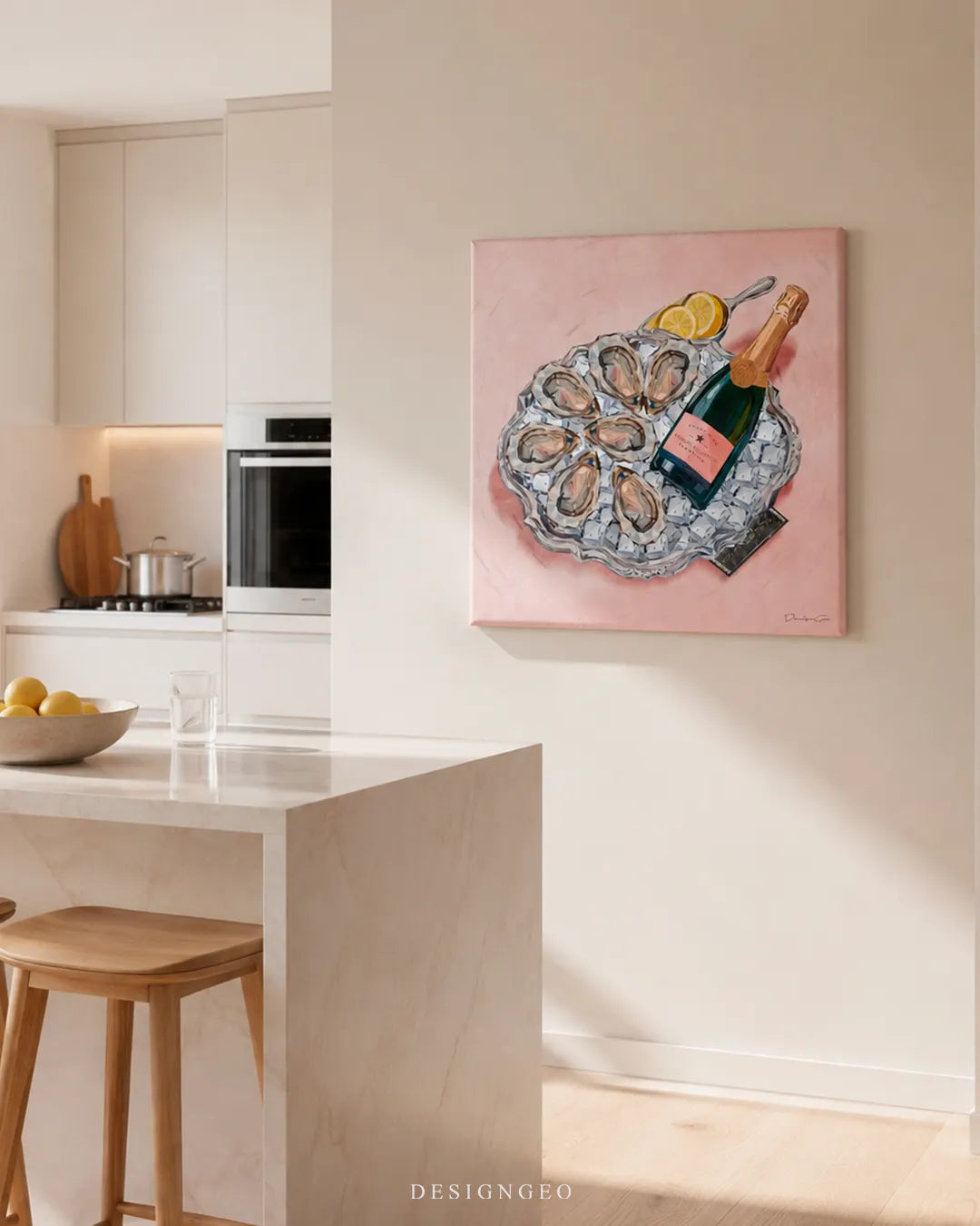 Square pink oysters and champagne canvas print mounted on a beige wall above a modern white marble kitchen island with wooden bar stools