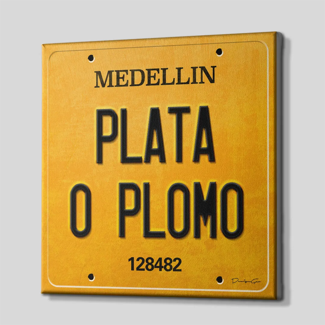 Three-quarter side angle of the Plata o Plomo Medellin license plate canvas wall art showing gallery-wrapped yellow edges mounted on a solid wooden frame