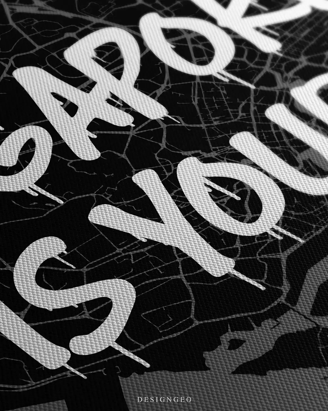 Detailed front close-up of the "Singapore Is Yours" urban canvas print, focusing on the stylized white spray paint drips and the sharp contrast against the dark cartographic background