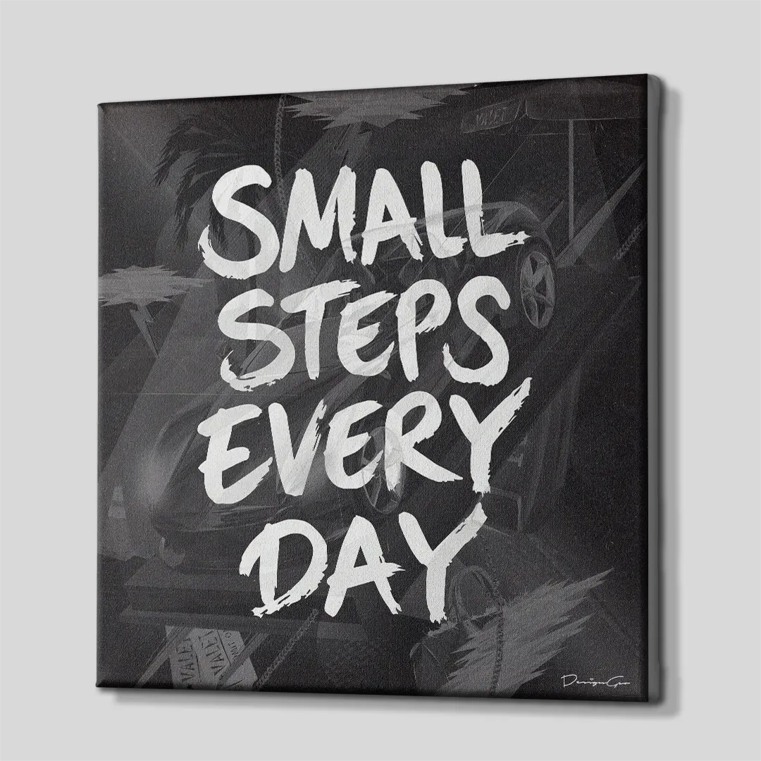 Three-quarter side angle of the square "SMALL STEPS EVERY DAY" canvas print, highlighting clean gallery-wrapped black edges mounted on solid wooden stretcher bars