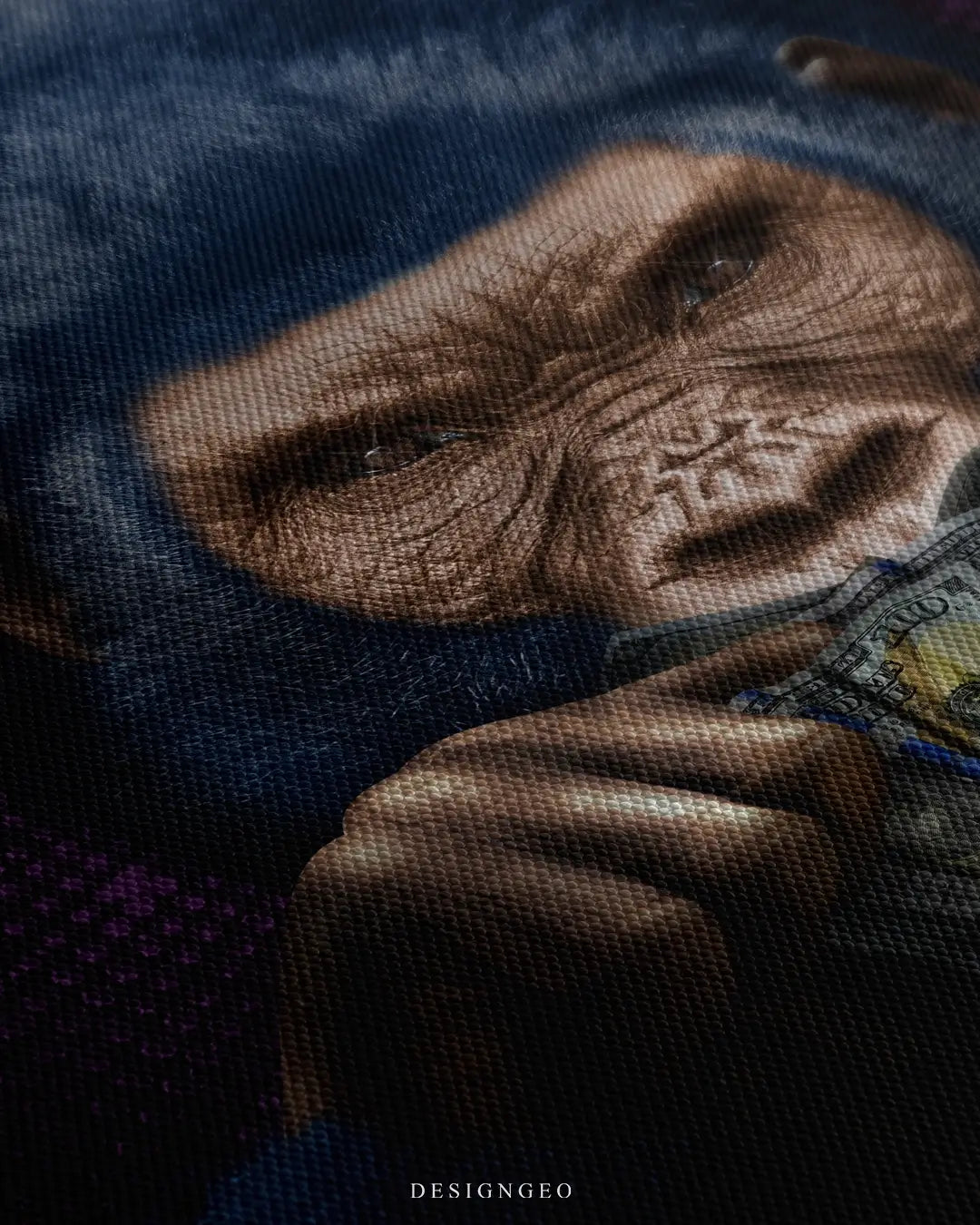 Close-up of motivational wall art featuring a powerful gorilla covering its mouth with US dollar bills on a solid black background, representing the "Speak No Evil" concept in a wealth context