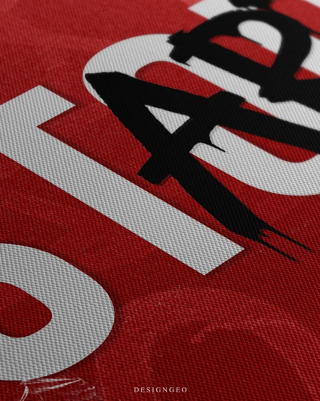 Close-up of urban style motivational art featuring the word "Start" with gritty spray paint textures and stencil details on a vibrant red background