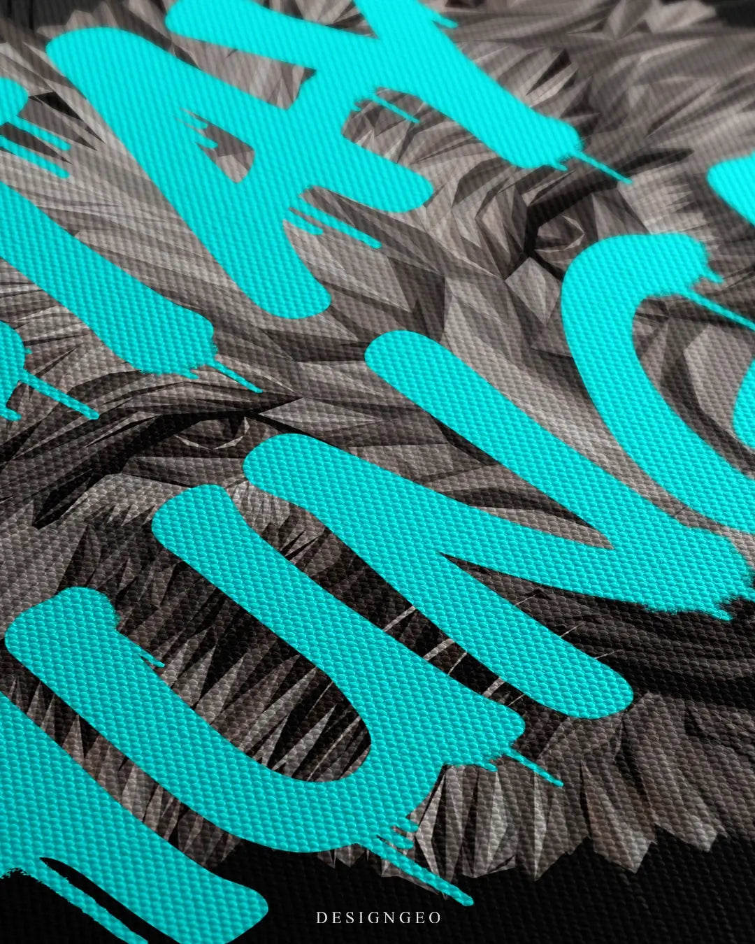 Close-up of modern motivational wall art featuring the "Stay Hungry" quote in a vibrant light blue graffiti font on a solid black background