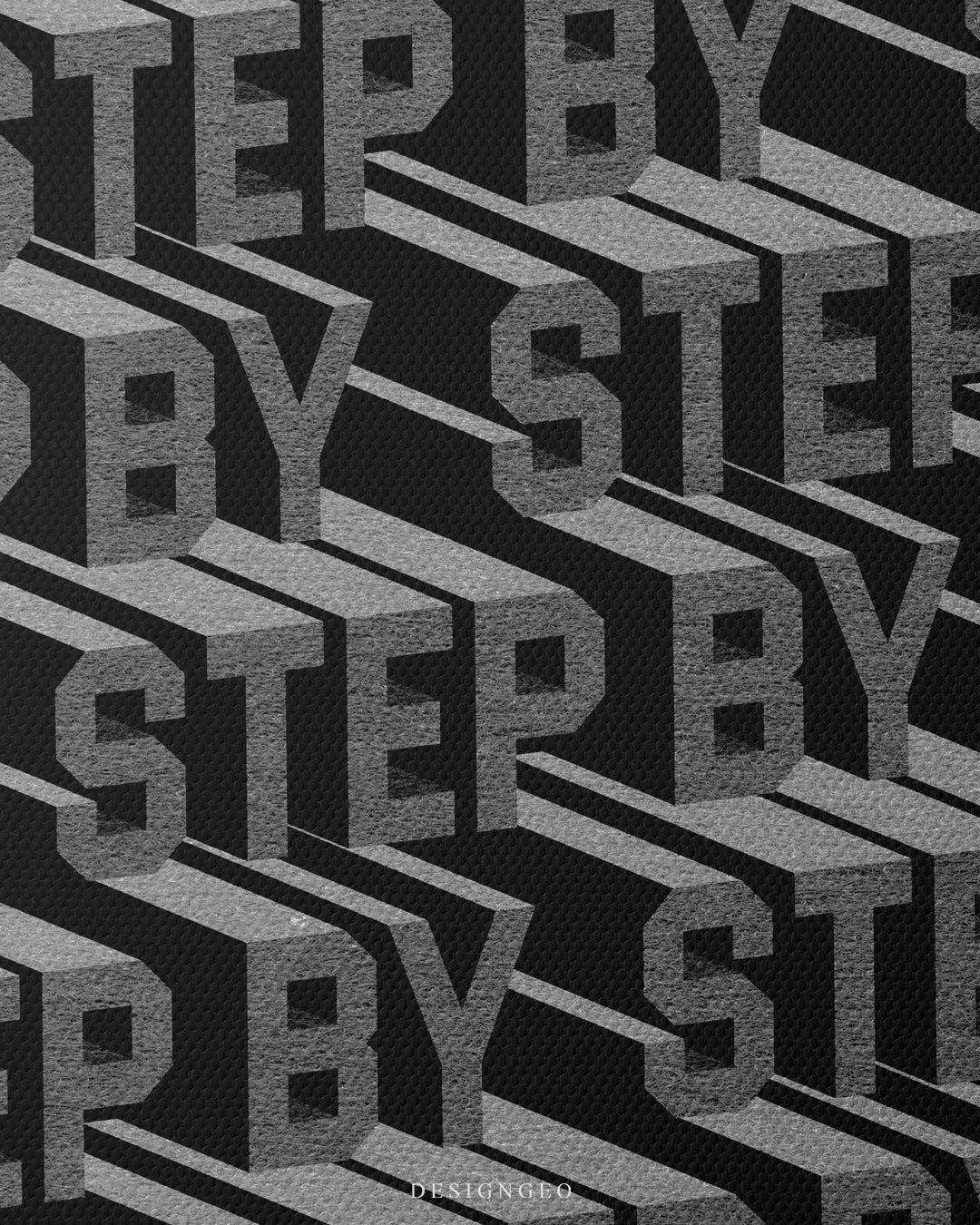 Medium shot showing grey 3D block lettering reading STEP BY STEP arranged in isometric steps against a dark textured background