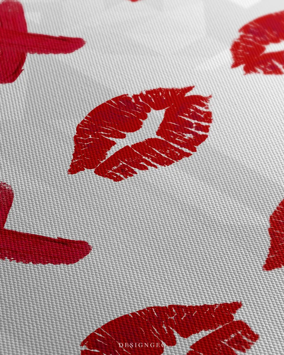 Close-up of luxury wall art featuring a Tic Tac Toe game played with red lipstick marks and minimalist crosses on a clean white background