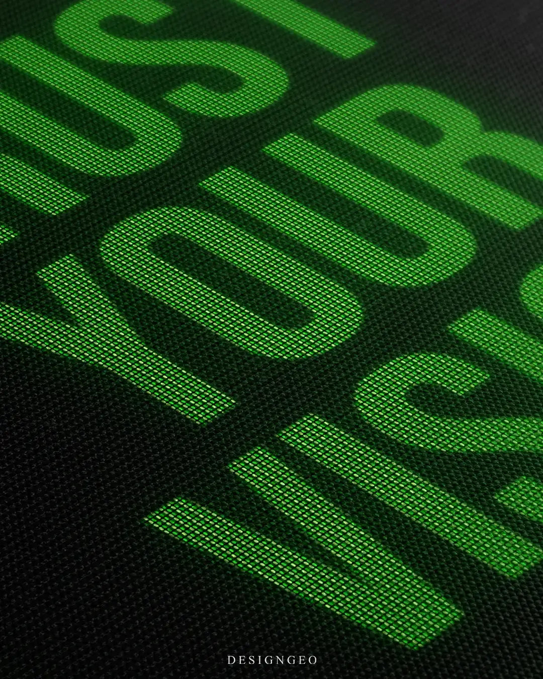 Close-up of modern typography wall art featuring the motivational phrase "Trust Your Vision" in a vibrant green font over a sleek black background