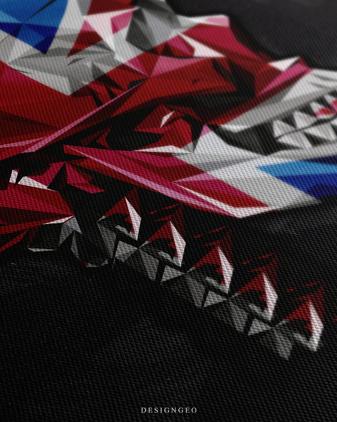 Detailed macro texture of woven canvas print showing low poly geometric skull profile with Union Jack UK flag colors on dark background