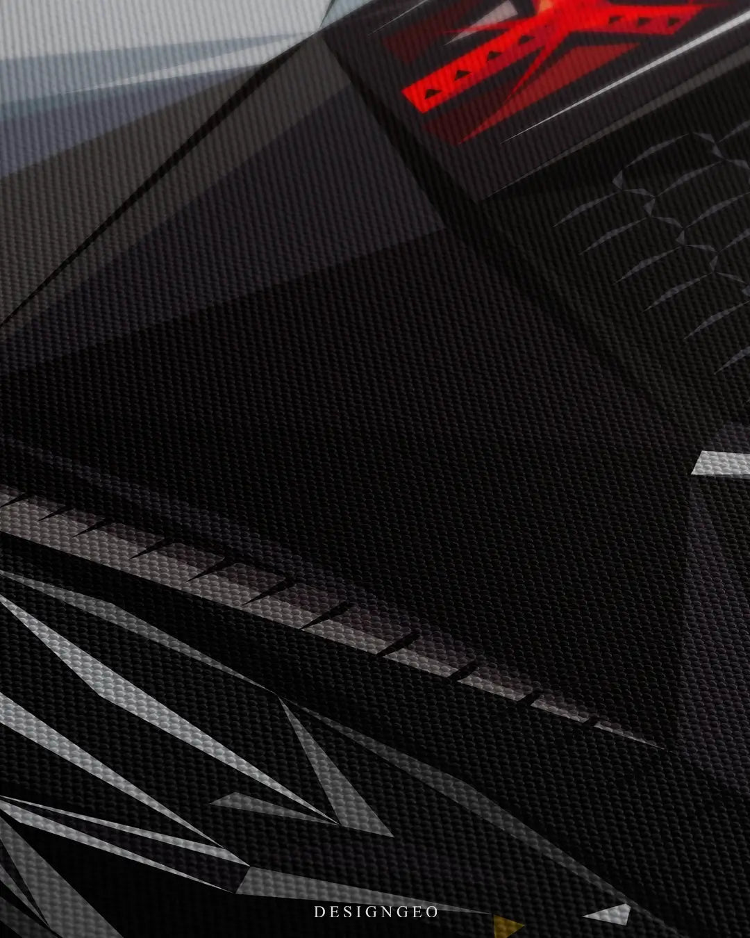 Close-up of modern automotive wall art featuring the sleek rear design and glowing tail lights of a sports car emerging from deep shadows