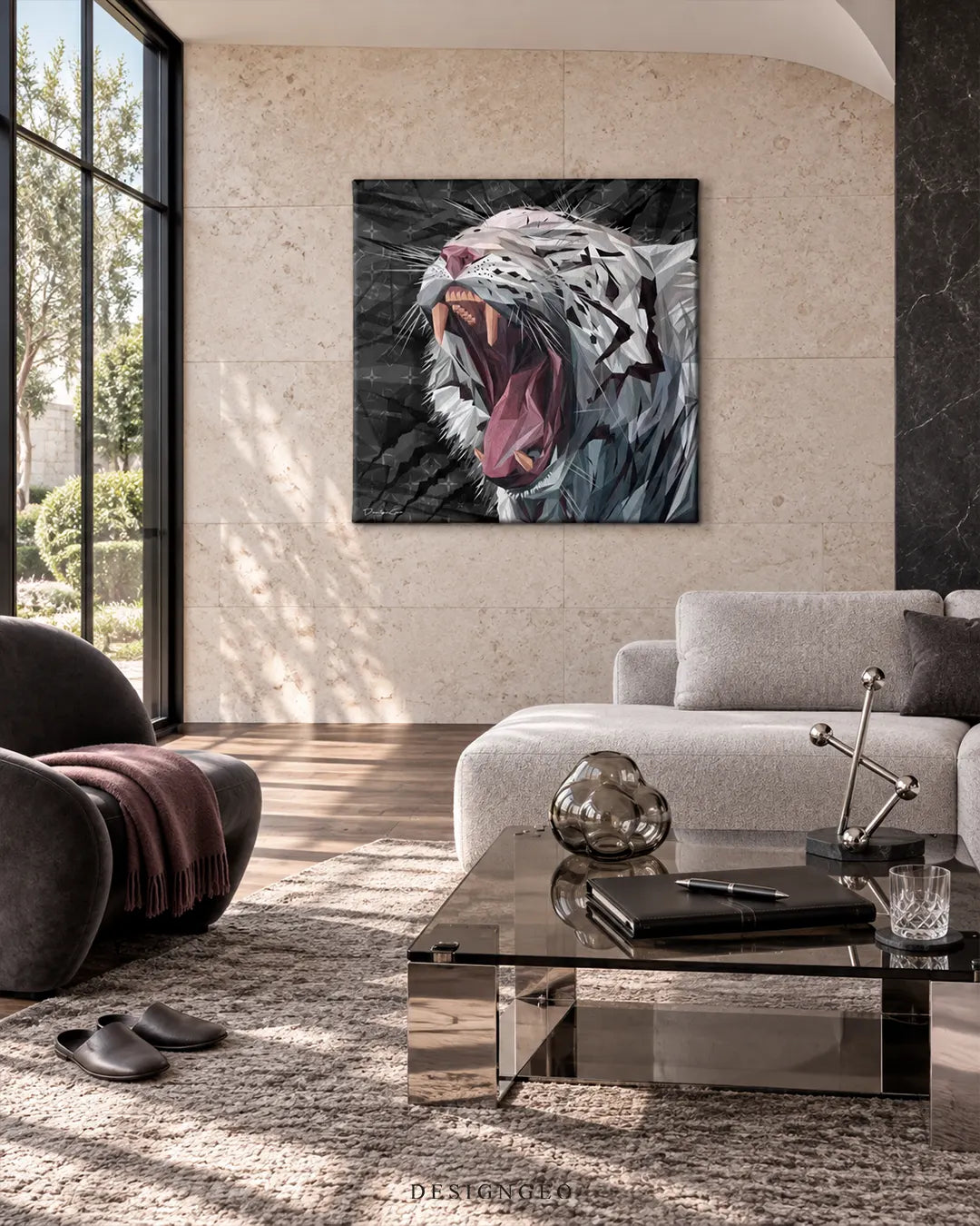 Square dark canvas print featuring a low-poly roaring white Bengal tiger mounted on a light beige stone wall in a luxury living room above a grey sectional sofa