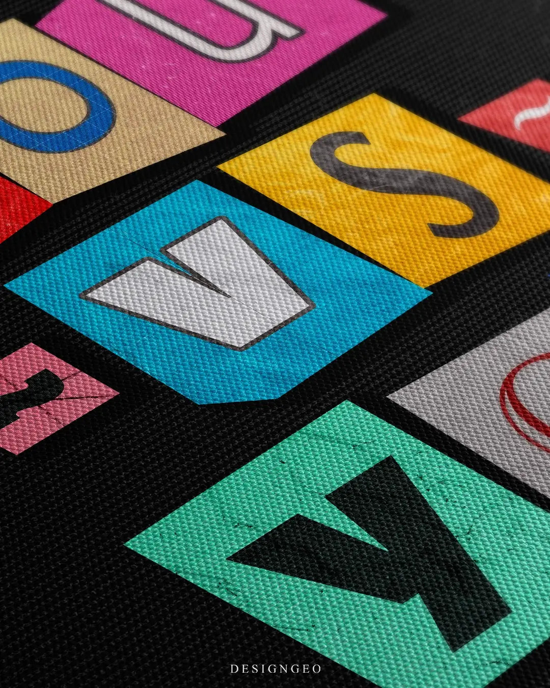 Close-up of motivational wall art featuring the phrase "You vs You" in vibrant colorful typography with realistic canvas textures and paint details