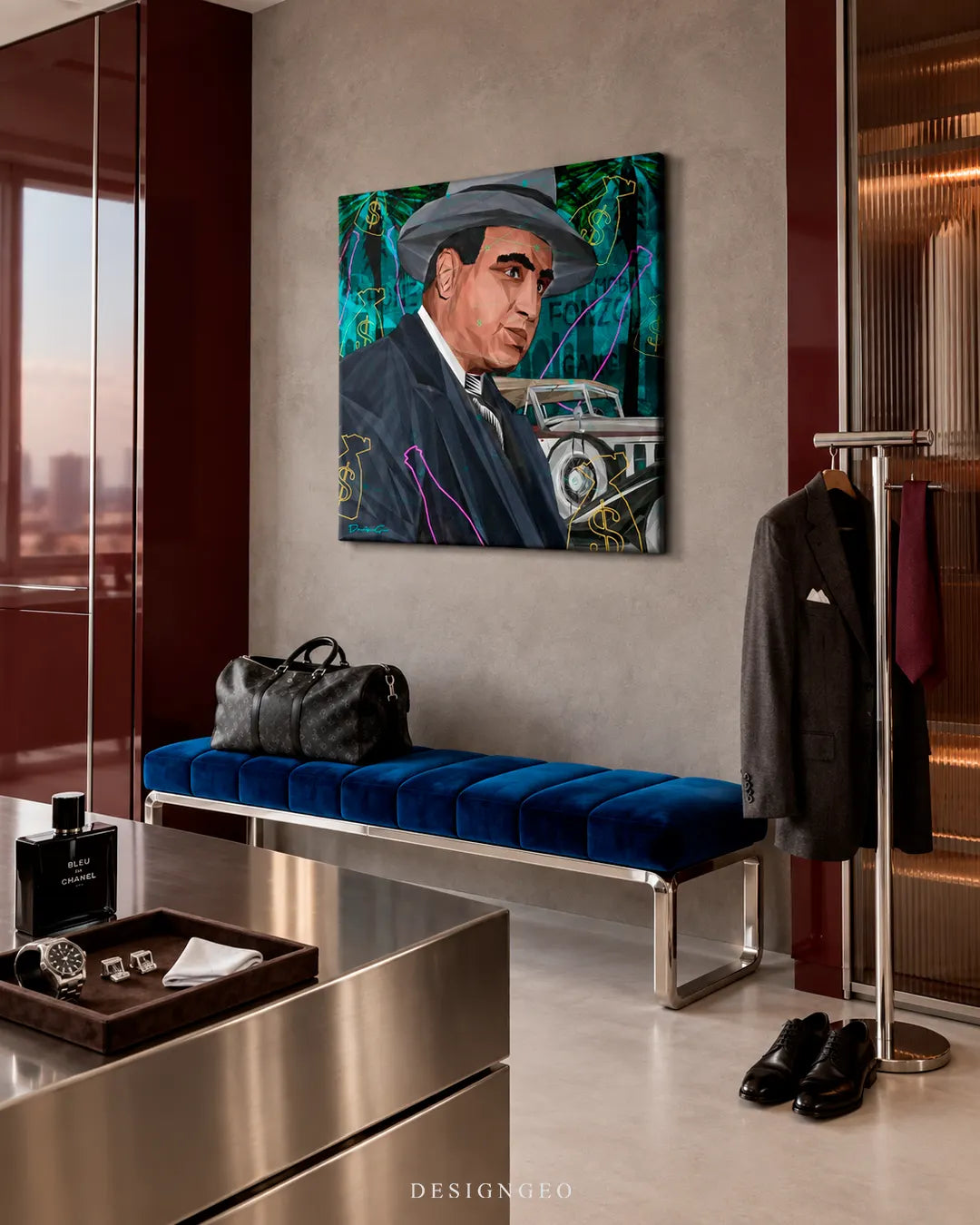 Modern luxury walk-in closet featuring a square canvas print of an Al Capone portrait with neon graffiti and a vintage car mounted on a beige wall above a blue velvet bench