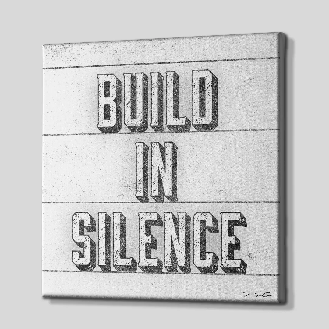 Three-quarter side angle of the Build in Silence canvas wall art showing gallery-wrapped printed edges mounted on a wooden frame