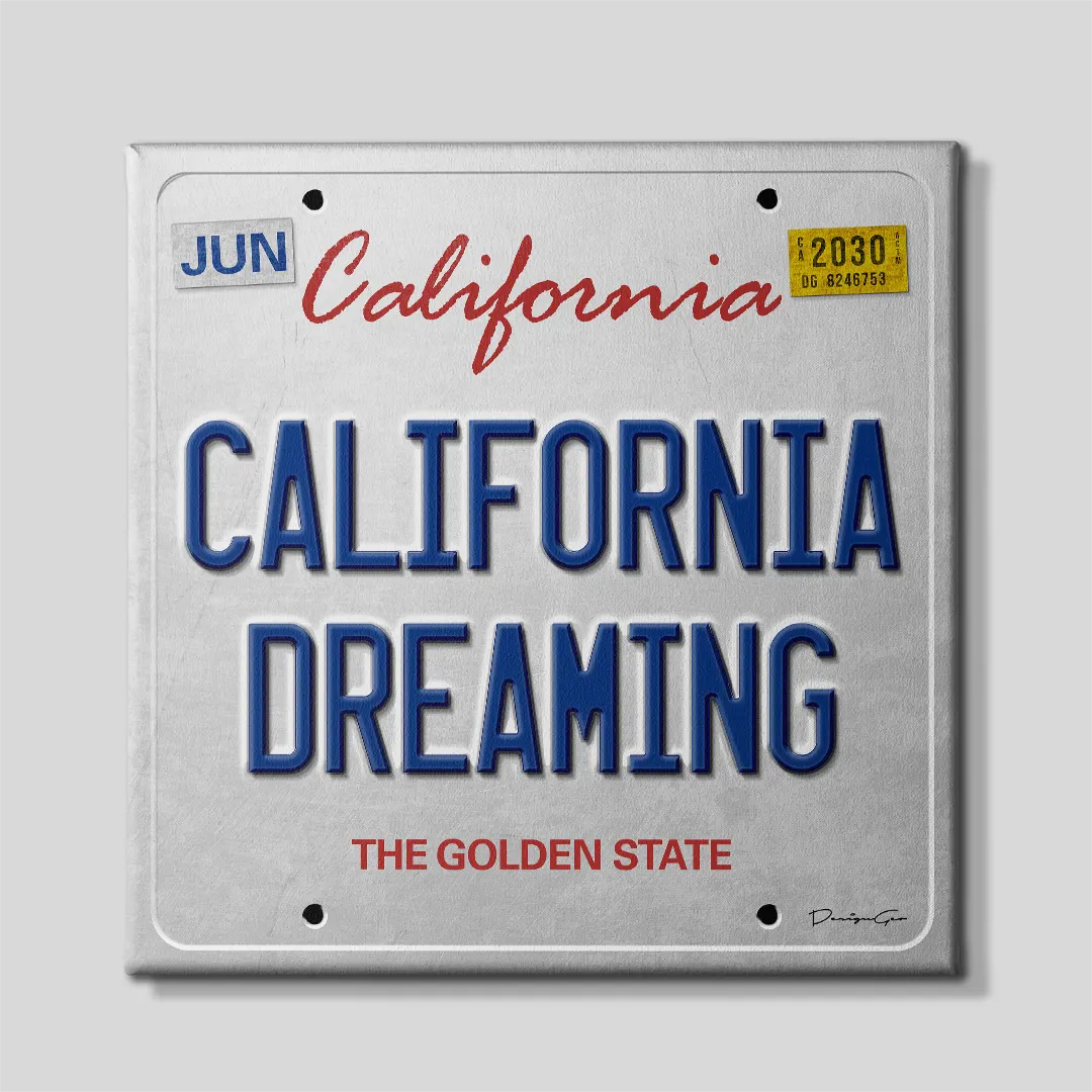 Front view of a square canvas print designed as a retro California license plate with blue CALIFORNIA DREAMING lettering, red state title, month and year stickers, and THE GOLDEN STATE slogan