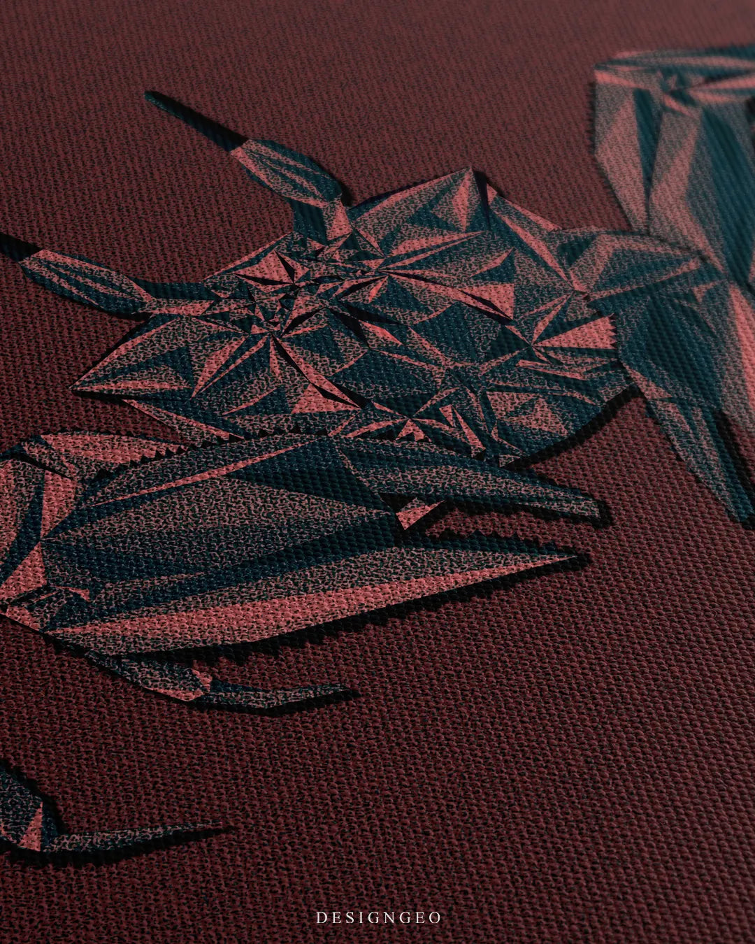 Angled macro shot showing the woven canvas material, stippled texture, and symmetrical polygonal shell of the geometric crab