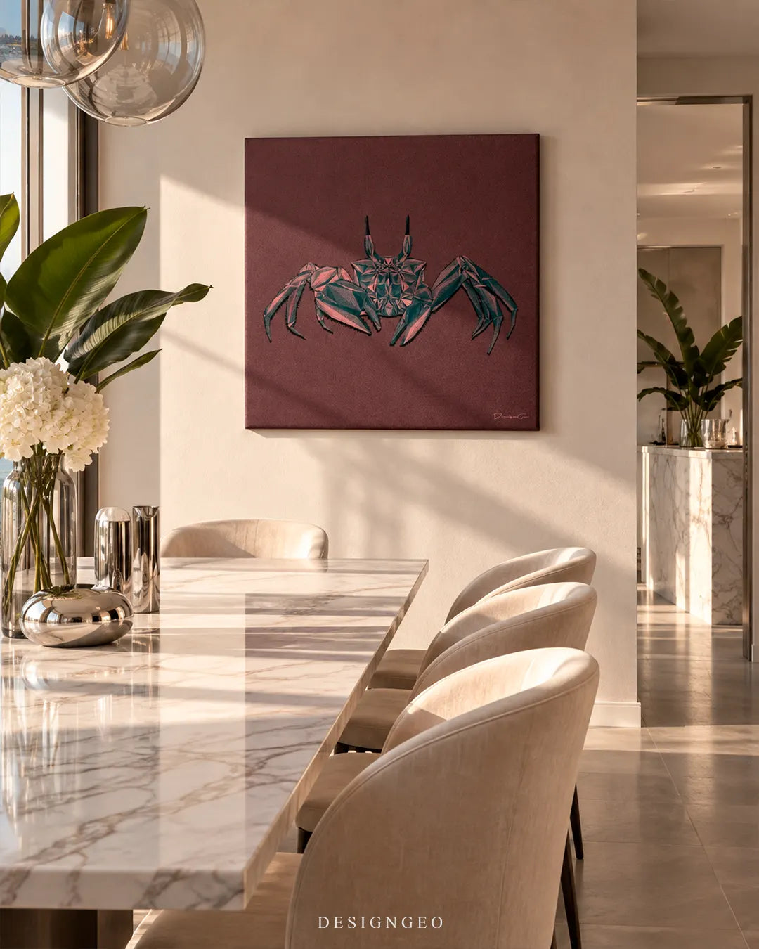 Elegant modern dining room featuring a square canvas print of a geometric teal and pink crab mounted on a beige wall above a white marble table