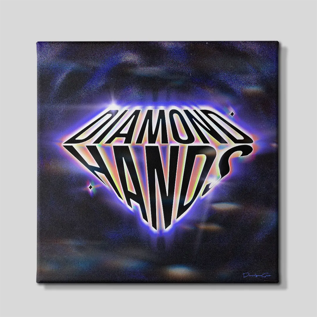 Front view of a square dark canvas print featuring the phrase DIAMOND HANDS in black typography shaped like a glowing diamond with a iridescent purple aura over a space-themed background