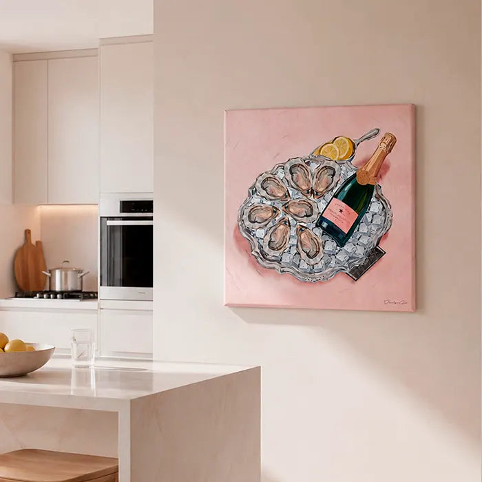 Dining room canvas wall art collection featuring a luxury tray of oysters and champagne on a soft pink background on a modern kitchen wall